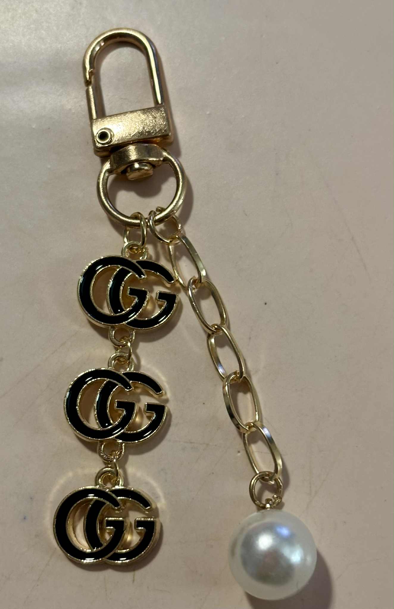 Bag charm G pearl black 3"