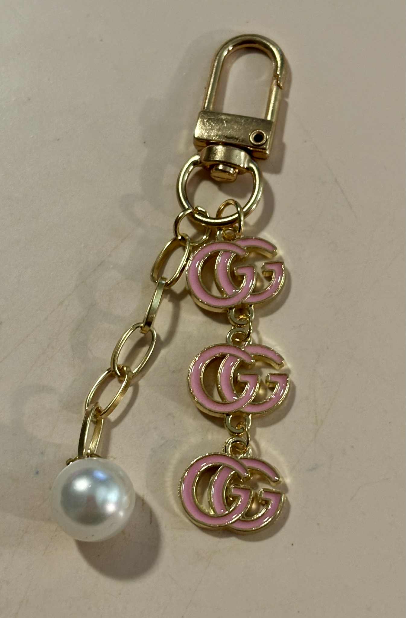 Bag charm G pearl pink 3"