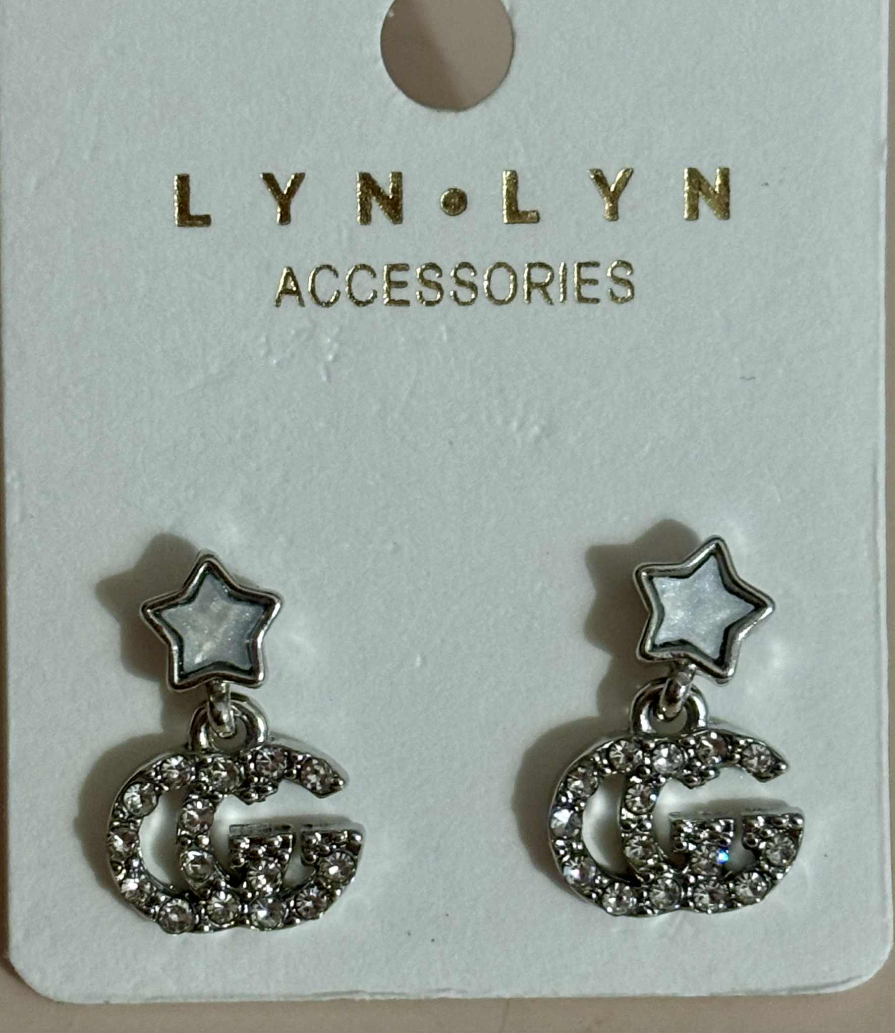 Earrings G tiny star silver