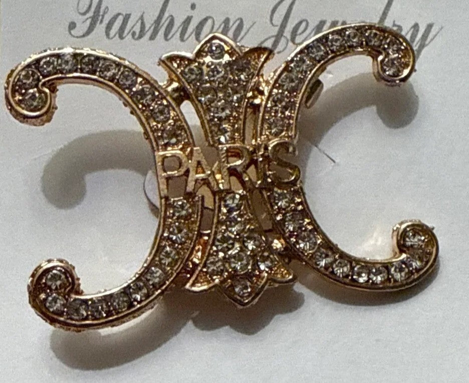 Broach Cel gold tone