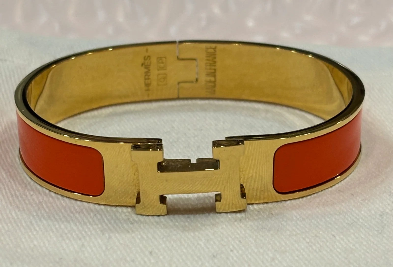 Bangle H orange stainless