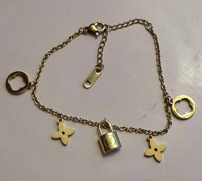 Bracelet L dangle charms gold