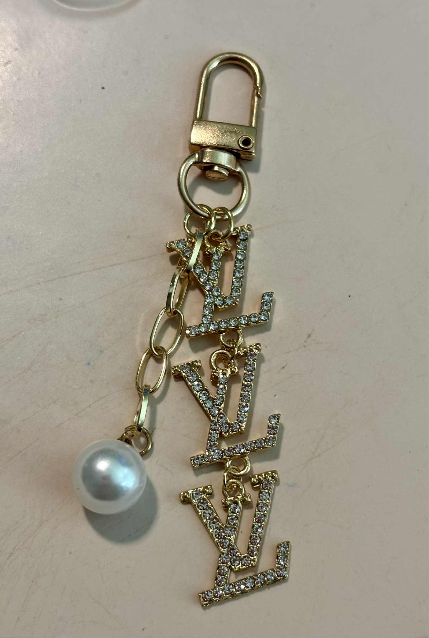 Bag charm L pearl gold 3"