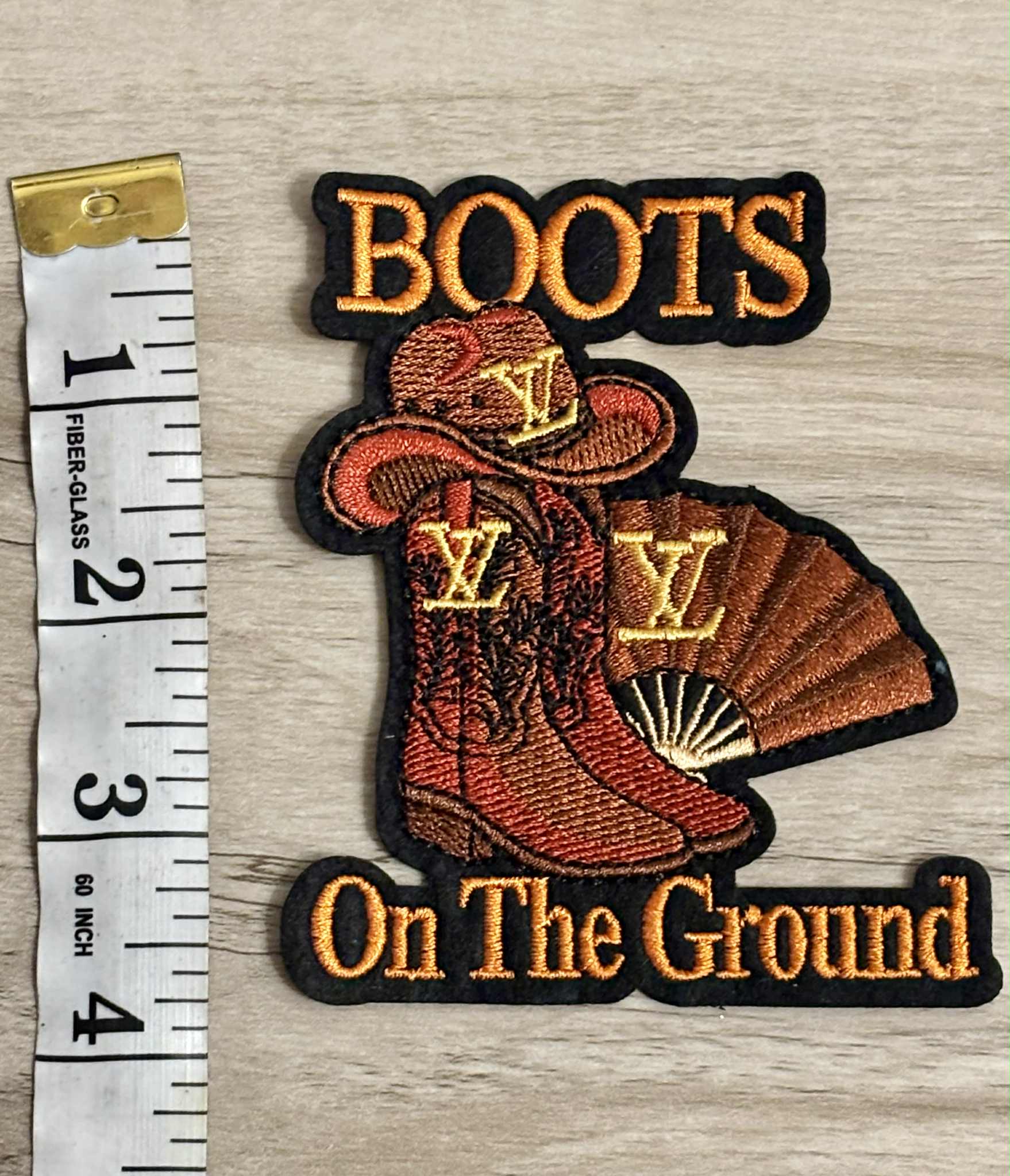 Patch L boots on the ground