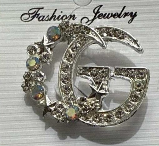 Bling G broach